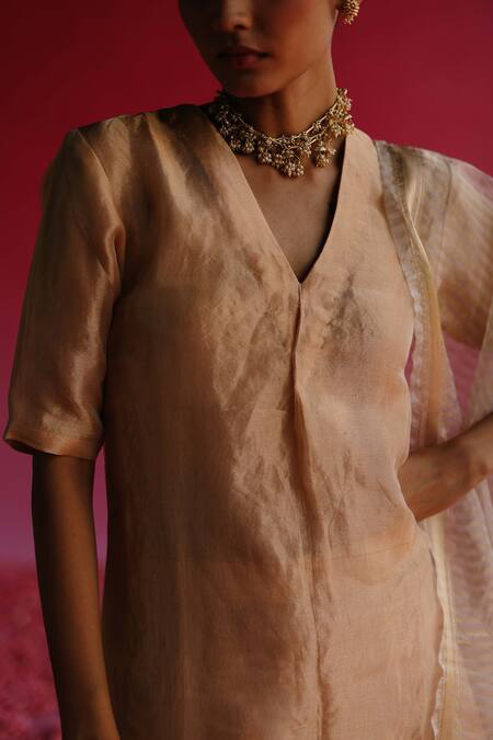 Taisha Gold Tissue, Silk, Brocade Zari V-neck Sudha Banarasi Kurta Set at Aza Fashions Taisha_Gold Tissue, Silk, Brocade Zari V-neck Sudha Banarasi Kurta Set _at_Aza_Fashions