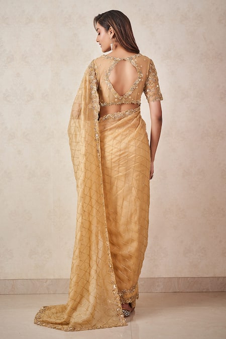 Shop Sammohi By Moksha And Hiral Gold Silk Organza, Tulle Sequins, Beads Hand Embroidered Saree With Blouse at Aza Fashions Shop_Sammohi By Moksha And Hiral_Gold Silk Organza, Tulle Sequins, Beads Hand Embroidered Saree With Blouse _at_Aza_Fashions
