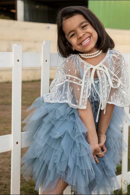 Shop Casa Ninos Grey Cotton, Net Sequins Ruffle Dress And Embroidered Cape Set at Aza Fashions Shop_Casa Ninos_Grey Cotton, Net Sequins Ruffle Dress And Embroidered Cape Set _at_Aza_Fashions