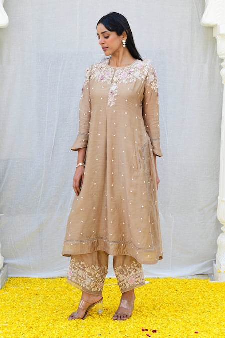 Shop Label Niti Bothra Ivory Silk Sequins, Pearls, Embroidery Round Neck Banaras Kurta And Palazzo Set at Aza Fashions Shop_Label Niti Bothra_Ivory Silk Sequins, Pearls, Embroidery Round Neck Banaras Kurta And Palazzo Set _at_Aza_Fashions