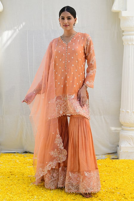 Label Niti Bothra Peach Banaras Silk Base Embroidered Floral V Neck Short Kurta Sharara Set 