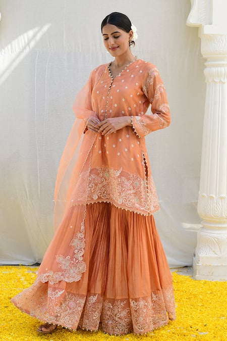 Label Niti Bothra Peach Silk Embroidery V-neck Banaras Short Kurta Sharara Set Online at Aza Fashions Label Niti Bothra_Peach Silk Embroidery V-neck Banaras Short Kurta Sharara Set _Online_at_Aza_Fashions