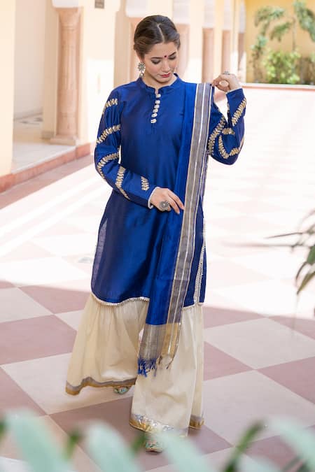 Shop The Home Affair Blue Cotton, Silk, Chanderi Gota Patti, Tassels Embroidered Kurta Gharara Set at Aza Fashions Shop_The Home Affair_Blue Cotton, Silk, Chanderi Gota Patti, Tassels Embroidered Kurta Gharara Set _at_Aza_Fashions