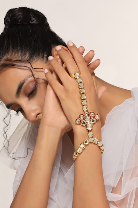 Shop Swabhimann Red Crystals, Stones Kundan Embellished Haathphool at Aza Fashions Shop_Swabhimann_Red Crystals, Stones Kundan Embellished Haathphool _at_Aza_Fashions