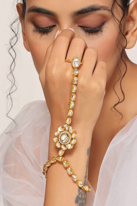 Swabhimann Gold Plated Crystals Kundan Embellished Haathphool Online at Aza Fashions Swabhimann_Gold Plated Crystals Kundan Embellished Haathphool _Online_at_Aza_Fashions