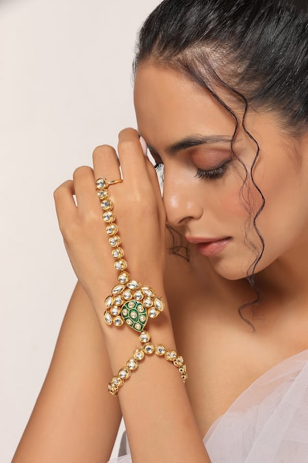 Shop Swabhimann Green Crystals, Stones Geometric Pattern Embellished Haathphool at Aza Fashions Shop_Swabhimann_Green Crystals, Stones Geometric Pattern Embellished Haathphool _at_Aza_Fashions