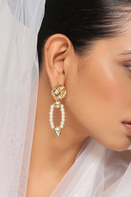 Shop Swabhimann Gold Plated Crystals, Pearls Kundan Embellished Earrings at Aza Fashions Shop_Swabhimann_Gold Plated Crystals, Pearls Kundan Embellished Earrings _at_Aza_Fashions