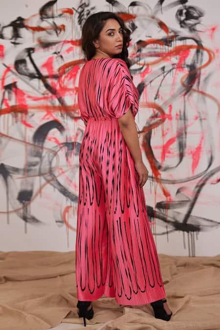 Shop Pooja Bagaria Pink Pleated Satin U Motifs Notched Jumpsuit at Aza Fashions Shop_Pooja Bagaria_Pink Pleated Satin U Motifs Notched Jumpsuit _at_Aza_Fashions