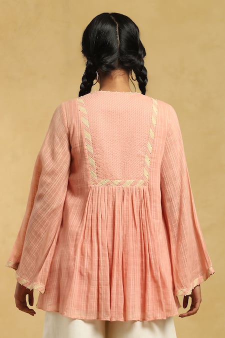 Shop Ritu Kumar Pink Cotton Beads, Embroidery Split V-neck Checkered Bell Sleeve Short Kurta at Aza Fashions Shop_Ritu Kumar_Pink Cotton Beads, Embroidery Split V-neck Checkered Bell Sleeve Short Kurta_at_Aza_Fashions