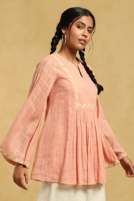 Shop Ritu Kumar Pink Cotton Beads, Embroidery Split V-neck Checkered Bell Sleeve Short Kurta Online at Aza Fashions Shop_Ritu Kumar_Pink Cotton Beads, Embroidery Split V-neck Checkered Bell Sleeve Short Kurta_Online_at_Aza_Fashions