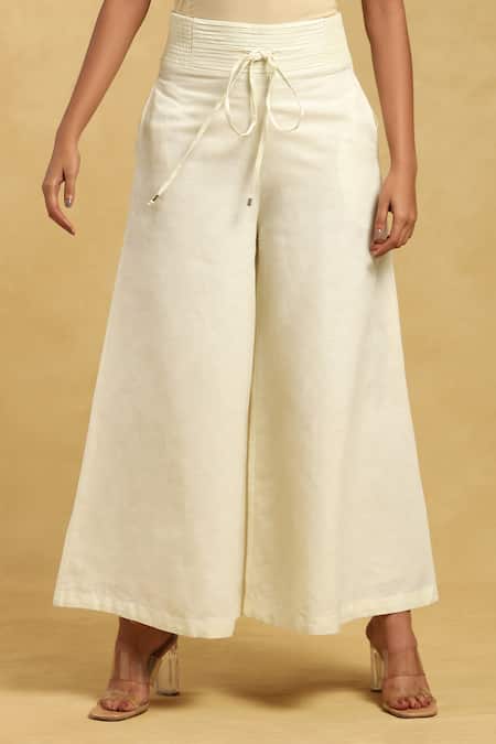 Ritu Kumar Off White Cotton, Silk Pleated Waistband Solid Palazzo Online at Aza Fashions Ritu Kumar_Off White Cotton, Silk Pleated Waistband Solid Palazzo_Online_at_Aza_Fashions