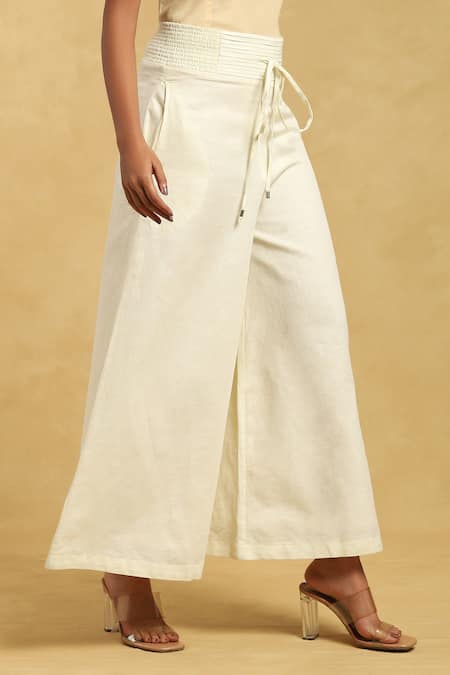 Shop Ritu Kumar Off White Cotton, Silk Pleated Waistband Solid Palazzo Online at Aza Fashions Shop_Ritu Kumar_Off White Cotton, Silk Pleated Waistband Solid Palazzo_Online_at_Aza_Fashions