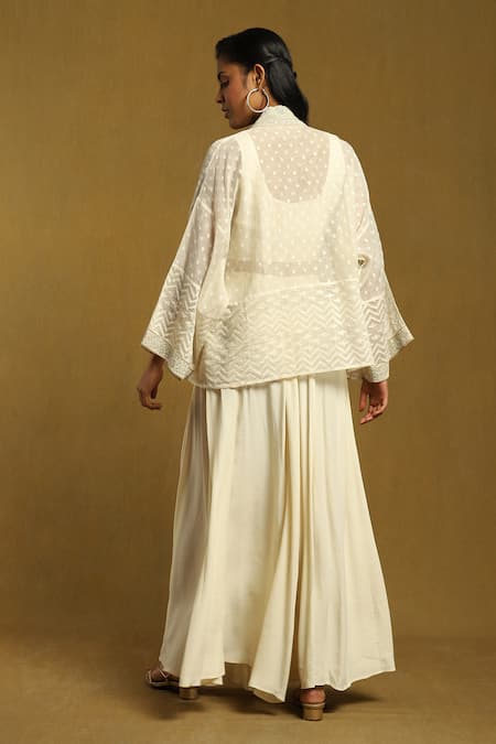 Shop Ritu Kumar Off White Cotton, Silk Embroidery Round Neck, Chevron Pattern Shrug Palazzo Set at Aza Fashions Shop_Ritu Kumar_Off White Cotton, Silk Embroidery Round Neck, Chevron Pattern Shrug Palazzo Set_at_Aza_Fashions