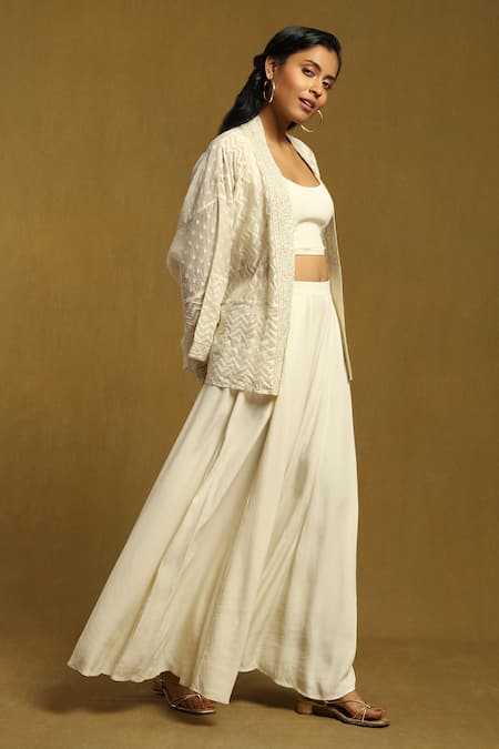 Shop Ritu Kumar Off White Cotton, Silk Embroidery Round Neck, Chevron Pattern Shrug Palazzo Set Online at Aza Fashions Shop_Ritu Kumar_Off White Cotton, Silk Embroidery Round Neck, Chevron Pattern Shrug Palazzo Set_Online_at_Aza_Fashions