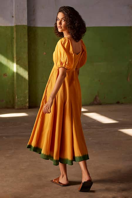 Shop Kharakapas Yellow Cotton, Muslin Square Neck Puff Sleeve Midi Dress at Aza Fashions Shop_Kharakapas_Yellow Cotton, Muslin Square Neck Puff Sleeve Midi Dress _at_Aza_Fashions