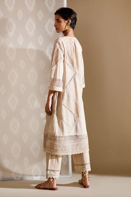 Shop Bunka Beige Voile Embellished Crochet Lace Keyhole Ezra Textured Tunic at Aza Fashions Shop_Bunka_Beige Voile Embellished Crochet Lace Keyhole Ezra Textured Tunic_at_Aza_Fashions