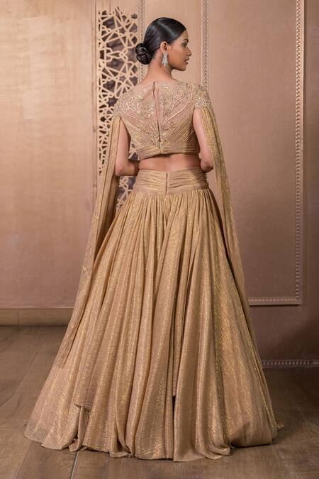 Shop Tarun Tahiliani Gold Crepe Crystals Round Neck Metallic Crinkle Tulle Skirt With Blouse at Aza Fashions Shop_Tarun Tahiliani_Gold Crepe Crystals Round Neck Metallic Crinkle Tulle Skirt With Blouse_at_Aza_Fashions