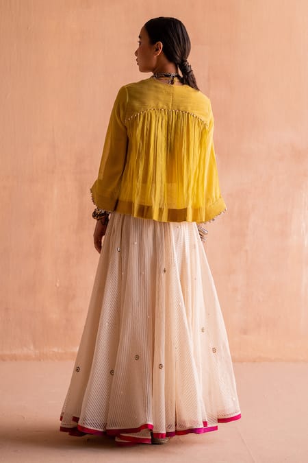 Shop Swatti Kapoor Yellow Chanderi Sequins, Beads Round Neck Kanji Handwoven Flared Top at Aza Fashions Shop_Swatti Kapoor_Yellow Chanderi Sequins, Beads Round Neck Kanji Handwoven Flared Top _at_Aza_Fashions