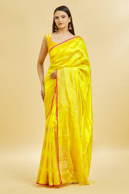 Mint N Oranges_Yellow Chanderi , Tassels Round Neck Plain Saree With Blouse Piece _Online_at_Aza_Fashions