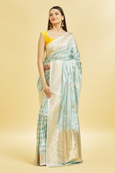 Mint N Oranges_Blue Silk Zari Round Neck Floral Pattern Saree With Blouse Piece_Online_at_Aza_Fashions