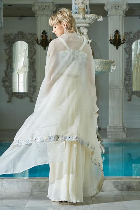 Shop Sayisha White Silk Hand Embroidery Floral Blouse Sweetheart Jacket Draped Skirt Set at Aza Fashions Shop_Sayisha_White Silk Hand Embroidery Floral Blouse Sweetheart Jacket Draped Skirt Set _at_Aza_Fashions