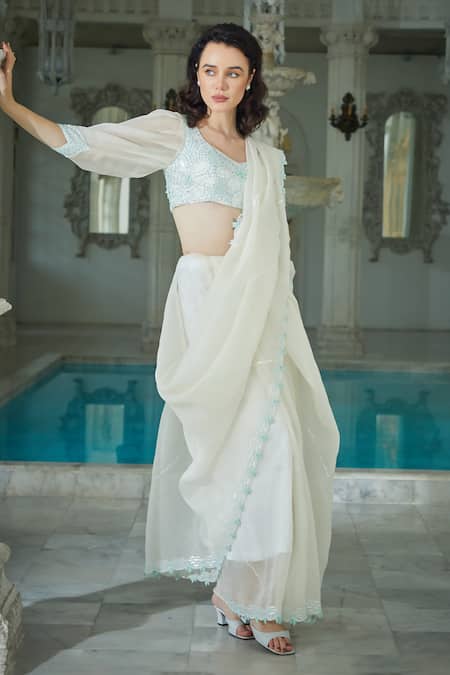 Shop Sayisha White Organza Hand Embroidery Floral Scallop Trim Saree With Puff Sleeve Blouse at Aza Fashions Shop_Sayisha_White Organza Hand Embroidery Floral Scallop Trim Saree With Puff Sleeve Blouse_at_Aza_Fashions