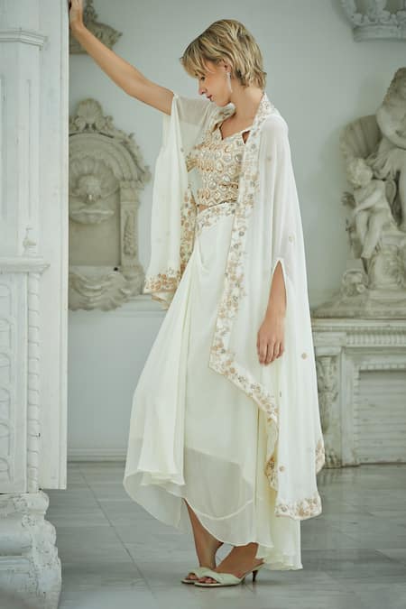 Shop Sayisha White Silk, Organza Embroidery Sweetheart Asymmetric Jacket And Drape Skirt Set at Aza Fashions Shop_Sayisha_White Silk, Organza Embroidery Sweetheart Asymmetric Jacket And Drape Skirt Set _at_Aza_Fashions