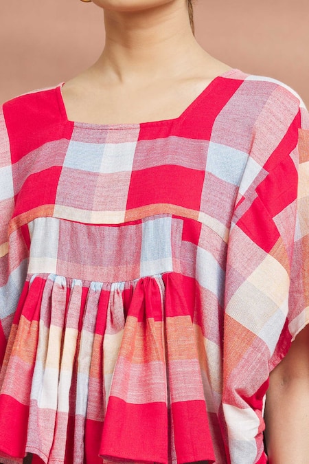 Naintara Bajaj_Red Cotton Square Neck Pleated Asymmetric Top _at_Aza_Fashions