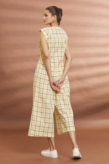 Shop Naintara Bajaj Yellow Cotton V-neck Checked Over-lap Jumpsuit at Aza Fashions Shop_Naintara Bajaj_Yellow Cotton V-neck Checked Over-lap Jumpsuit _at_Aza_Fashions