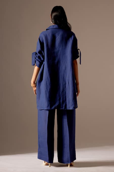 Shop Mini Sondhi Blue Linen Embroidery, Applique Abstract Face Jacket With Trouser at Aza Fashions Shop_Mini Sondhi_Blue Linen Embroidery, Applique Abstract Face Jacket With Trouser _at_Aza_Fashions