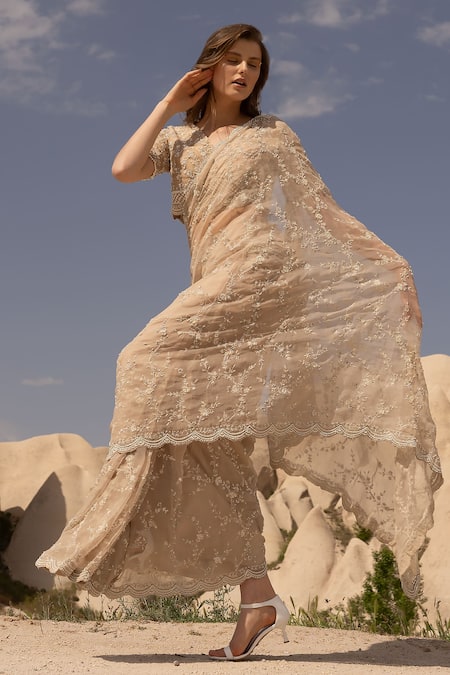 COUTURE BY NIHARIKA_Beige Organza Sequins, Beads Round Neck Floral Embroidered Saree With Blouse _at_Aza_Fashions