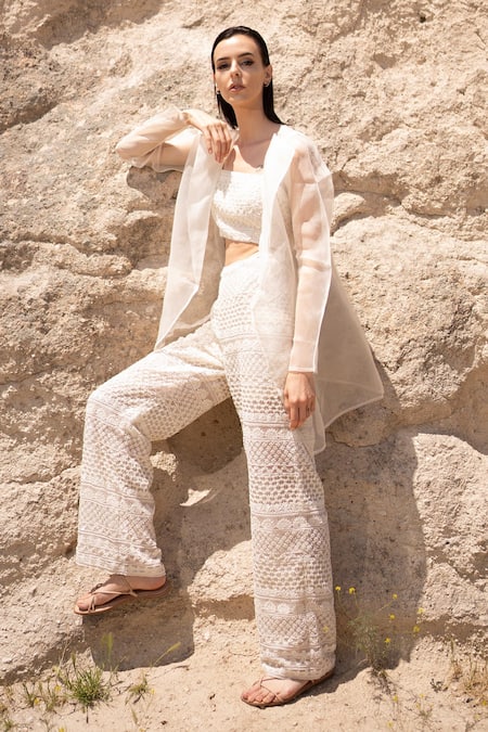Shop COUTURE BY NIHARIKA Ivory Organza Sequins, Beads Open Neck, Sheer Jacket And Hand Embroidered Pant Set at Aza Fashions Shop_COUTURE BY NIHARIKA_Ivory Organza Sequins, Beads Open Neck, Sheer Jacket And Hand Embroidered Pant Set _at_Aza_Fashions