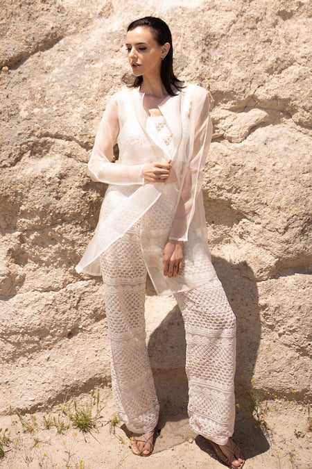 COUTURE BY NIHARIKA Ivory Organza Sequins, Beads Open Neck, Sheer Jacket And Hand Embroidered Pant Set at Aza Fashions COUTURE BY NIHARIKA_Ivory Organza Sequins, Beads Open Neck, Sheer Jacket And Hand Embroidered Pant Set _at_Aza_Fashions
