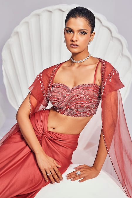 Shop Divya Aggarwal Red Satin Cut Work Sweetheart Neck Lana Hand Embroidered Cape Skirt Set Online at Aza Fashions Shop_Divya Aggarwal_Red Satin Cut Work Sweetheart Neck Lana Hand Embroidered Cape Skirt Set _Online_at_Aza_Fashions