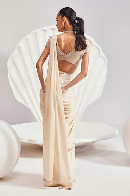 Shop Divya Aggarwal Ivory Chiffon, Satin Beads Sweetheart Pre-draped Embellished Saree With Blouse at Aza Fashions Shop_Divya Aggarwal_Ivory Chiffon, Satin Beads Sweetheart Pre-draped Embellished Saree With Blouse _at_Aza_Fashions