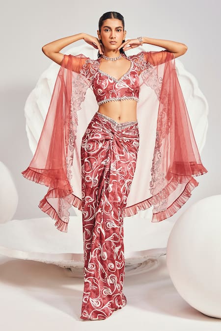 Shop Divya Aggarwal Red Satin Sequins, Beads, Pearls Organza Embellished Cape And Knotted Skirt Set Online at Aza Fashions Shop_Divya Aggarwal_Red Satin Sequins, Beads, Pearls Organza Embellished Cape And Knotted Skirt Set _Online_at_Aza_Fashions