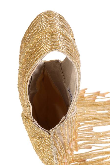 Shop_Fuchsia by aashaka mehta_Gold Beads, Tassels Enchanted Embellished Potli Clutch _Online_at_Aza_Fashions