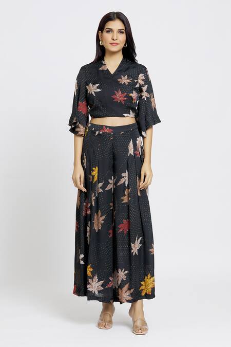 Whimsical By Shica Black Satin, Organza V-neck Maple Dot Print Wrap Top And Flared Pant Set at Aza Fashions Whimsical By Shica_Black Satin, Organza V-neck Maple Dot Print Wrap Top And Flared Pant Set _at_Aza_Fashions