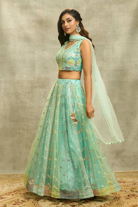 Aariyana Couture Blue Silk, Net Embroidery, Mirrors V-neck Chevron Lehenga Set at Aza Fashions Aariyana Couture_Blue Silk, Net Embroidery, Mirrors V-neck Chevron Lehenga Set_at_Aza_Fashions