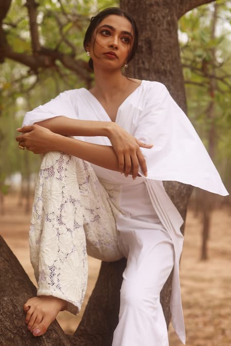 COUCHÉ By Anandini_Ivory Cotton, Lycra, Lace Embroidery V-neck Floral Draped Jumpsuit _Online_at_Aza_Fashions