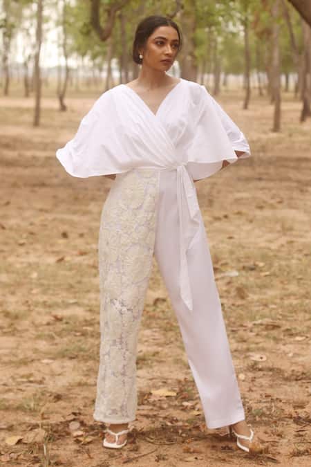 Buy_COUCHÉ By Anandini_Ivory Cotton, Lycra, Lace Embroidery V-neck Floral Draped Jumpsuit _Online_at_Aza_Fashions
