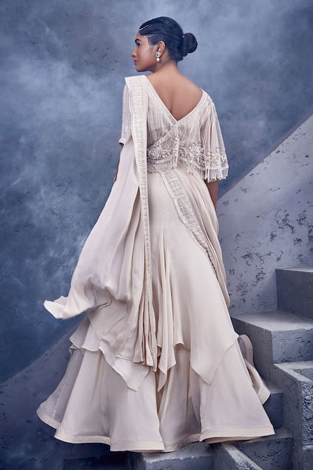 Shop Miku Kumar Ivory Net, Georgette, Viscose Tassels, Embroidery Blouse And Pre-draped Saree Set at Aza Fashions Shop_Miku Kumar_Ivory Net, Georgette, Viscose Tassels, Embroidery Blouse And Pre-draped Saree Set _at_Aza_Fashions