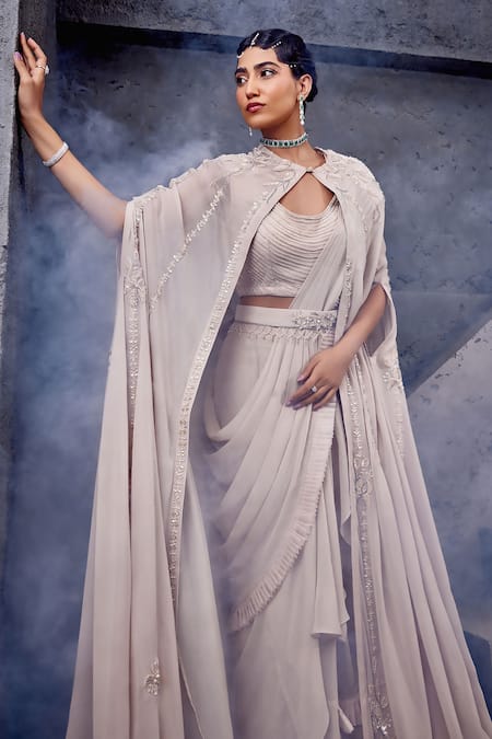 Buy Miku Kumar Ivory Georgette, Net Embroidery, Tassels Cape And Pre-draped Ruffle Saree Set Online at Aza Fashions Buy_Miku Kumar_Ivory Georgette, Net Embroidery, Tassels Cape And Pre-draped Ruffle Saree Set _Online_at_Aza_Fashions