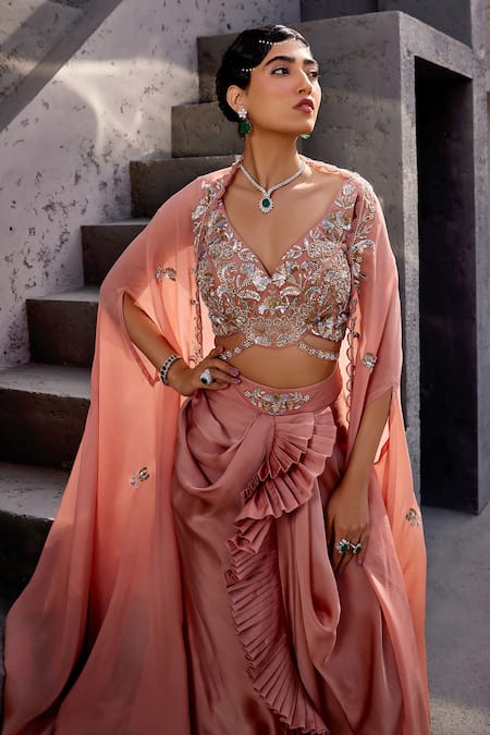 Shop Miku Kumar Peach Viscose, Satin, Organza Sequins, Pearl Embellished Cape Draped Skirt Set Online at Aza Fashions Shop_Miku Kumar_Peach Viscose, Satin, Organza Sequins, Pearl Embellished Cape Draped Skirt Set _Online_at_Aza_Fashions