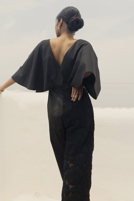 Shop Couché By Anandini Black Cotton, Lycra, Lace Embroidery V-neck Draped Jumpsuit at Aza Fashions Shop_Couché By Anandini_Black Cotton, Lycra, Lace Embroidery V-neck Draped Jumpsuit _at_Aza_Fashions