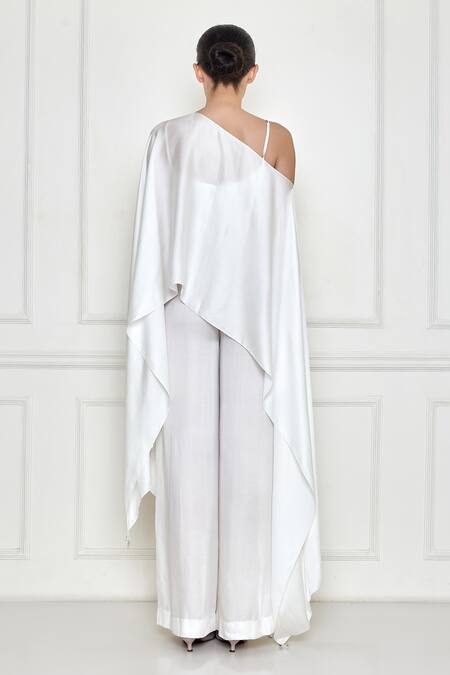 Shop Dilnaz White Cotton Satin Asymmetric Over Layer With Jumpsuit at Aza Fashions Shop_Dilnaz_White Cotton Satin Asymmetric Over Layer With Jumpsuit _at_Aza_Fashions