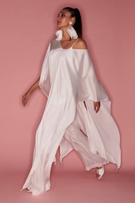 Shop Dilnaz White Cotton Satin Asymmetric Over Layer With Jumpsuit Online at Aza Fashions Shop_Dilnaz_White Cotton Satin Asymmetric Over Layer With Jumpsuit _Online_at_Aza_Fashions