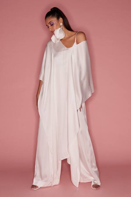 Dilnaz White Cotton Satin Asymmetric Over Layer With Jumpsuit at Aza Fashions Dilnaz_White Cotton Satin Asymmetric Over Layer With Jumpsuit _at_Aza_Fashions