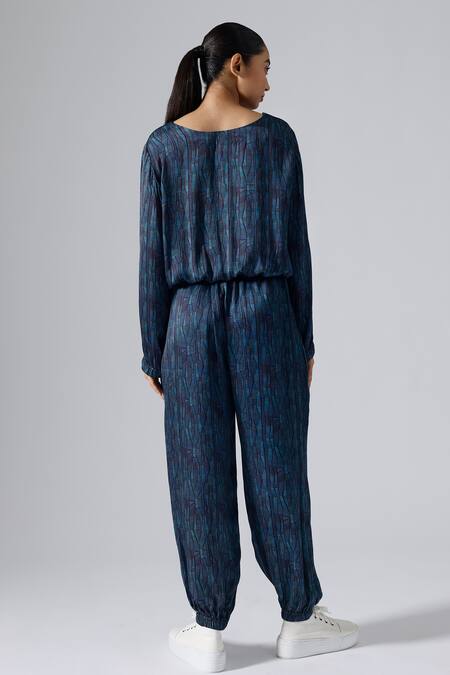 Shop_Klad_Blue Satin Printed Abstract Lines Round Top And Jogger Pant Set_at_Aza_Fashions