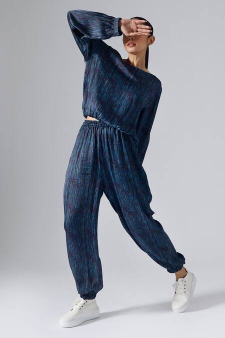 Shop_Klad_Blue Satin Printed Abstract Lines Round Top And Jogger Pant Set_Online_at_Aza_Fashions